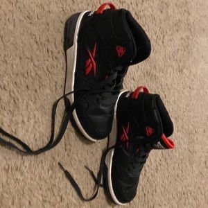 Reebok shoes. Lots of life left and no rips or holes.